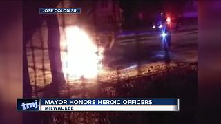 Milwaukee police officers honored for fiery crash rescue