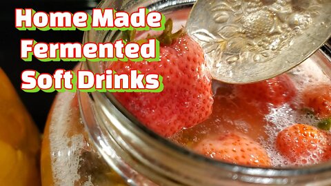 Homemade Fermented Soft Drinks Pineapple Strawberries and Lemon