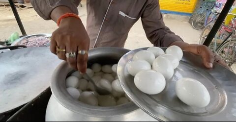 Popular Indian street food: Boiling Egg Fry from Bihar