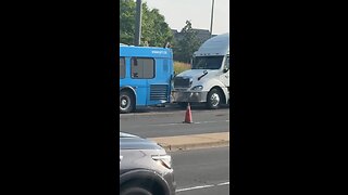 Truck Crashes Into Bus