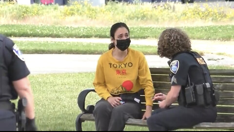 AntiFa Girl Gets Challenged For Trolling A Freedom Rally, Calls The Police, And Loses Her Mind