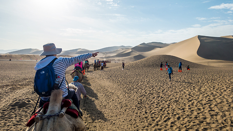 Riding Camels and Hang Gliders in the Gobi Desert China