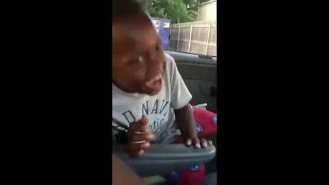 Black funny kid laughing