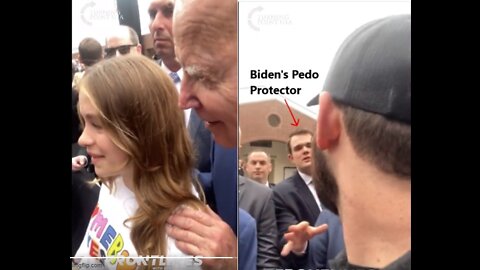 Biden sneaks up behind girl, grabs her shoulders and tells her 'no serious guys until you're 30