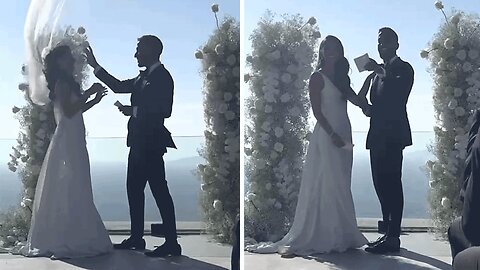 Bride's Veil flying away during Wedding Ceremony in Santorini