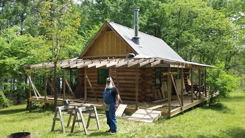 Off Grid Log Cabin Build, Wrap Around Porch, Metal Roof Installation