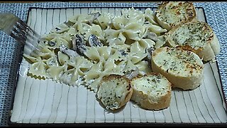 Creamy Mushroom Garlic sauce over bowtie pasta & cheesy bread