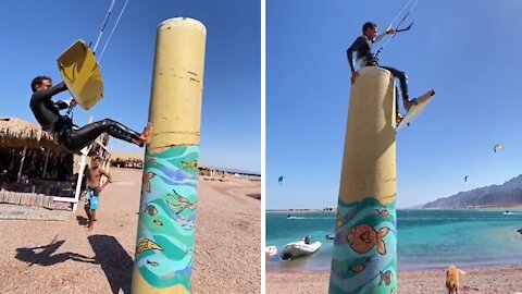 Kite surfer uses amazing technique to take off into the air