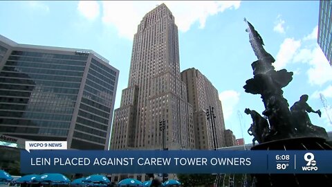 Carew Tower's new owner filed liens against himself