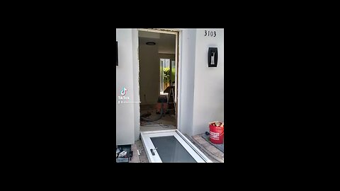 Residential front door replacement in Miami, Florida.