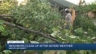 Neighbors clean up after tornado blows through Tulsa