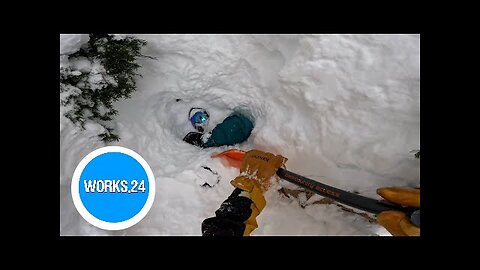 Snowboarder stuck deep in snow rescued by skier in Washington |