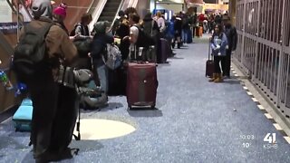 Travelers brave delays at Kansas City International Airport ahead of Christmas