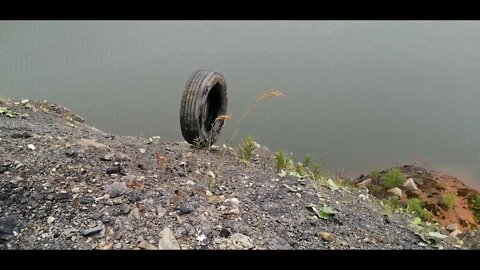 Rolling tyre into Quarry