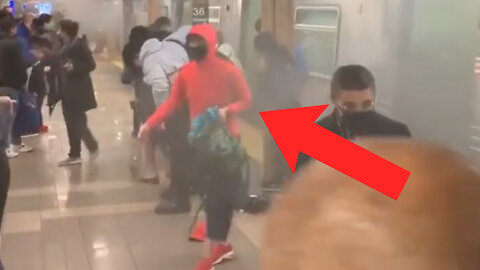 NEW LOOK: "Red Hoodie" Has Subway Shooting Victim Pose for Picture