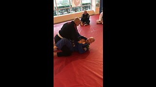 Scissor sweep from guard