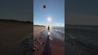 Playing catch at the beach