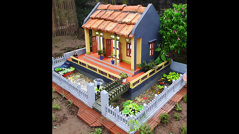 Make your garden more beautiful with a mini house and aquarium