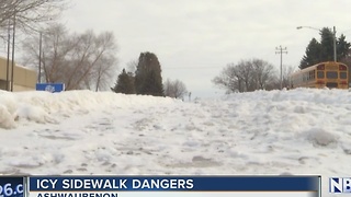 Icy, snow-covered sidewalks pose danger to handicapped