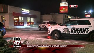 Police investigating armed robbery at Hungry Howie's Pizza
