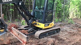 This machine digs holes and ditches