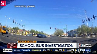 Investigation after school bus appears to run red light