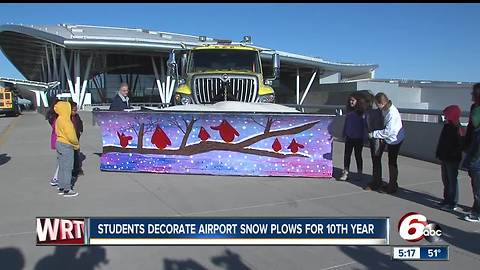 Students decorate Indianapolis airport snowplow