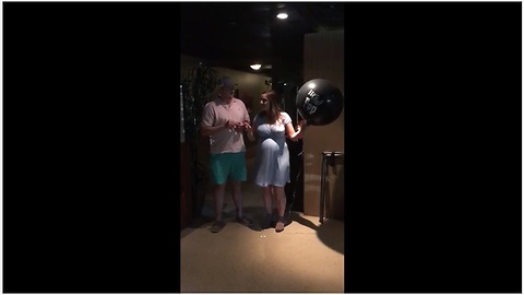 Parents-To-Be Pop A Huge Black Balloon During Gender Reveal, Then Everyone Starts Cheering