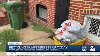 Recycling dumpsters set up today