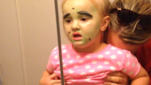Girl Scared By Her Own Face Paint