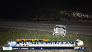 Car slams into washing machine on freeway