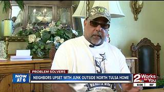 Neighbors upset with junk outside north Tulsa home