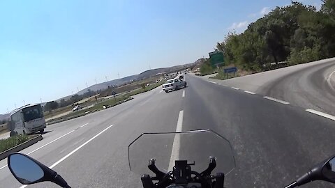 Insane Footage Shows Motorcycle's Near Miss With Vehicle