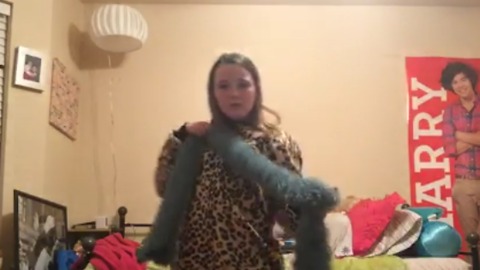 A Girl Falls Down Dancing With Her Christmas Presents