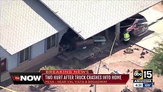 Two hurt after truck crashes into Mesa house