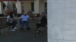 Families reunited during outdoor visits at senior care facilities