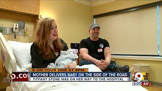 Mother delivers baby on the side of the road