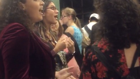 University of San Juan students serenade crowd in NYC Subway