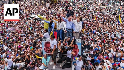 Thousands of opposition supporters gather with leaders in Venezuela for peaceful rally