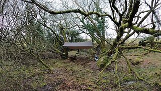 tidying underneath the tarp before taking it down . speedlapse Dartmoor 26th March 2023