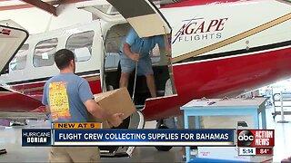 Flight crew collecting supplies for The Bahamas