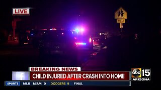 Child, 2 hurt after car crashes into West Phoenix home