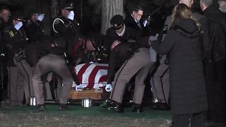Dep. Pickett's casket is removed from hearse and taken to burial sit