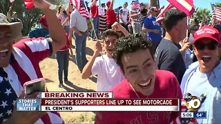 President's supporters line up to see motorcade