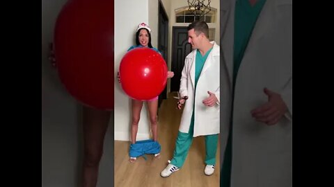 doctor pops nurse's balloon for surprise