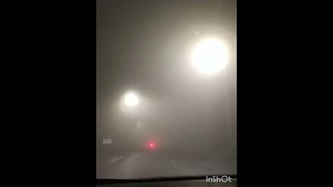 Driving at night in heavy fog , Northern Ireland