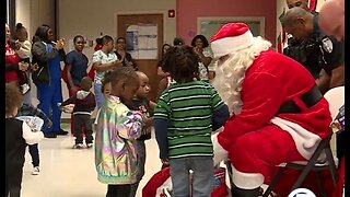 Santa delivers gifts to critically ill children