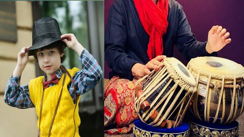 Video of playing tabla to the beat of the song.