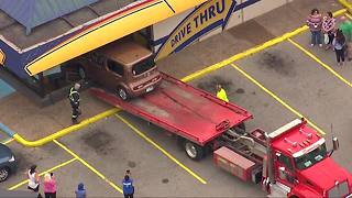 Car crashes into Church's Chicken in metro Detroit