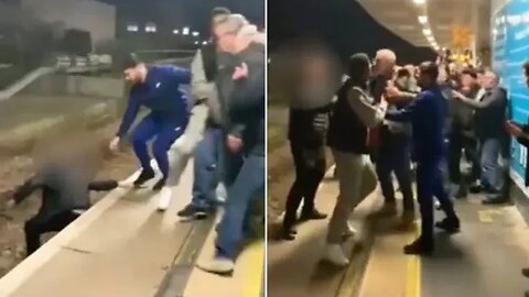 Moment Football Fan Fight Railway Track mass brawl breaks out between Tottenham & Arsenal supporters